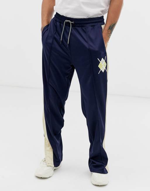 Fila tracksuit bottoms with logo in cream - exclusive to ASOS