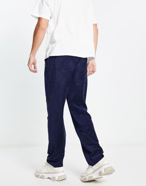 Plons Stewart Island Versnipperd Fila cord joggers with logo in navy | ASOS