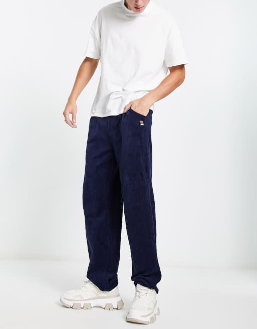 Plons Stewart Island Versnipperd Fila cord joggers with logo in navy | ASOS