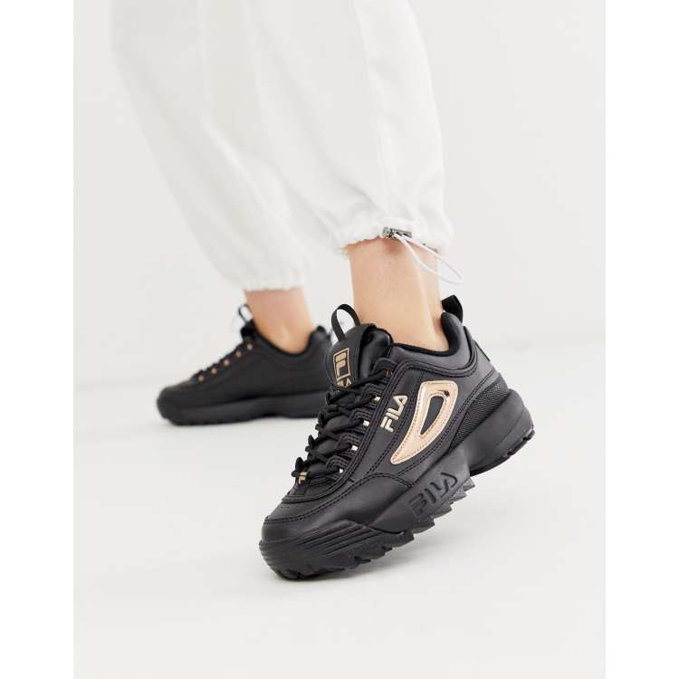 Fila Disruptor II in black with rose gold | ASOS