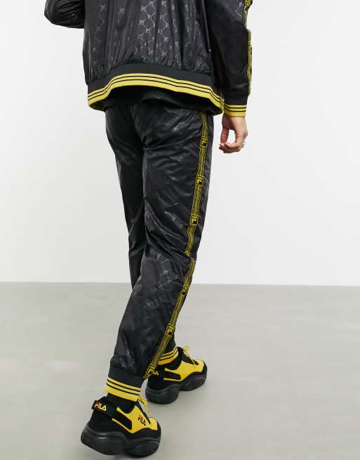 Fila hot sale tracksuit gold