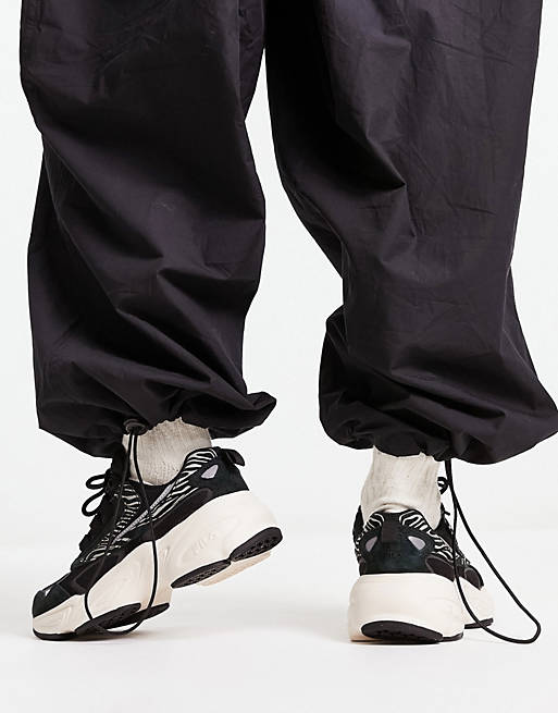 Fila Hypercube sneakers in black and zebra print in black | ASOS