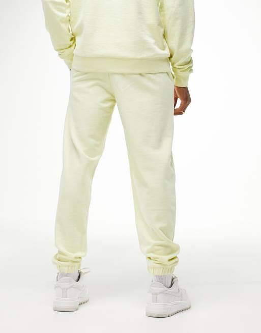 Fila tracksuit bottoms with logo in cream - exclusive to ASOS