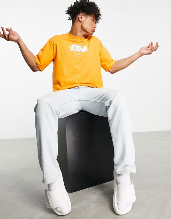 https://images.asos-media.com/products/fila-oversized-t-shirt-with-back-print-in-orange-exclusive-to-asos/202638052-2?$n_550w$&wid=550&fit=constrain