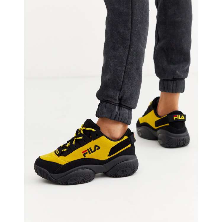 Fila Provenance sneakers in black and yellow ASOS