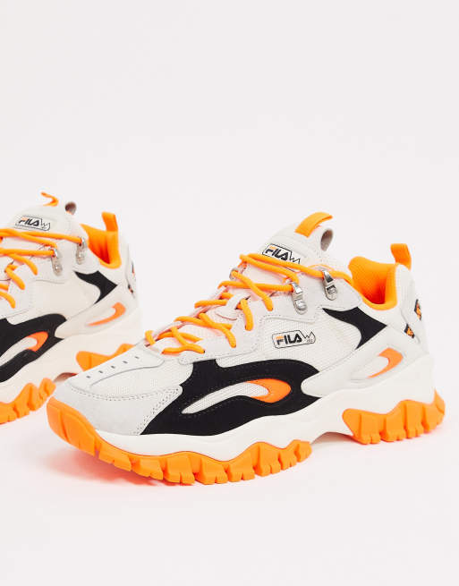 Fila blanche store et orange