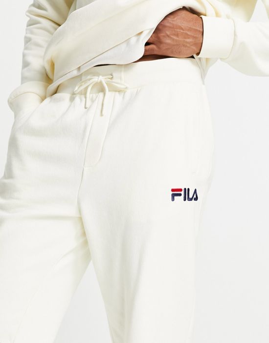https://images.asos-media.com/products/fila-sweatpants-with-logo-in-off-white/201044369-3?$n_550w$&wid=550&fit=constrain