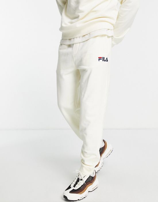 https://images.asos-media.com/products/fila-sweatpants-with-logo-in-off-white/201044369-4?$n_550w$&wid=550&fit=constrain