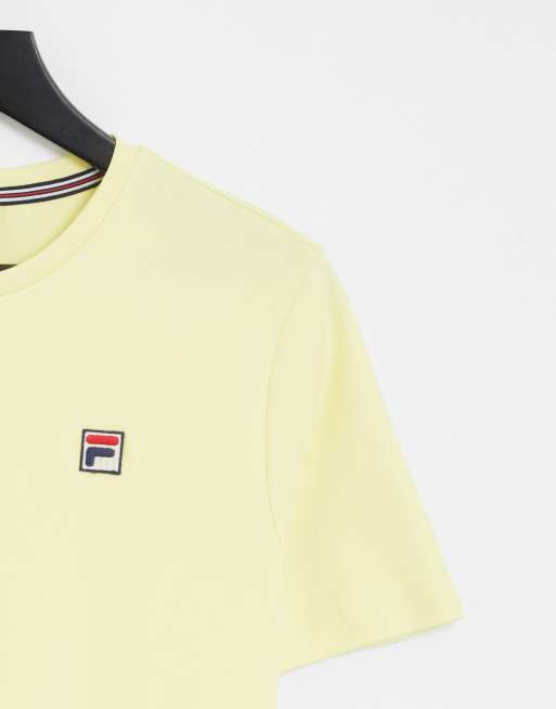 Yellow and store white fila shirt