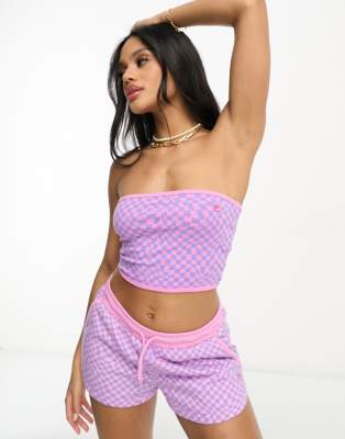 Fila warped check shorts in pink and purple