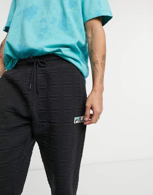 Fila wright jacquard logo joggers in black ASOS