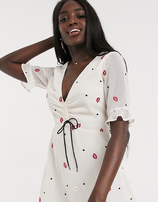 Finders Keepers chi chi lips and daisy print mini dress in vanilla daisy