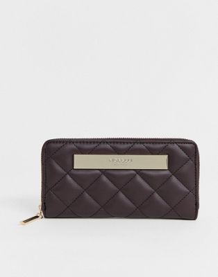 Fiorelli – Auberginefärgad quiltad handväska med dragkedja runt om-Lila