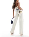 Fiorucci high waist straight leg jeans with angel bum patch in off white denim