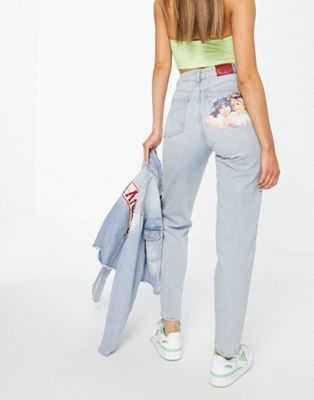 Fiorucci slouchy mom jeans in vintage wash with angel graphic