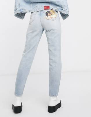 fiorucci angel patch jeans