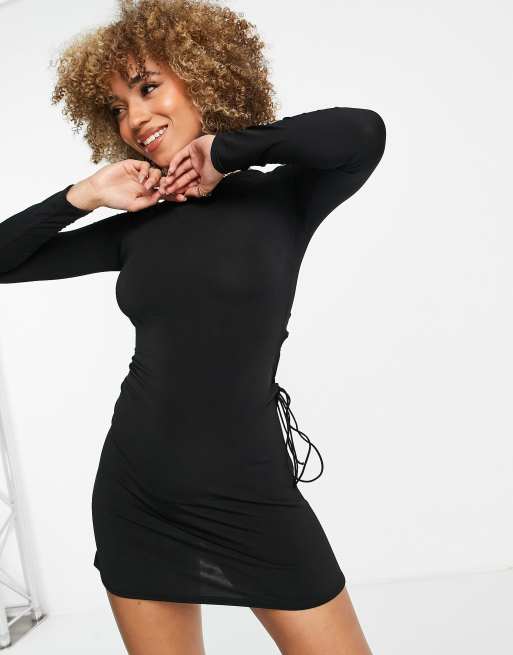 First Distraction The Label asymmetric lace up mini dress in black | ASOS