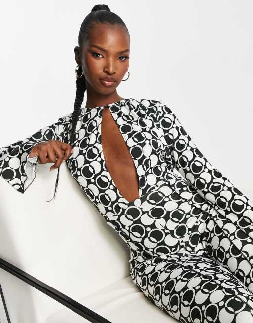 First Distraction The Label cut out jumpsuit in mono print | ASOS