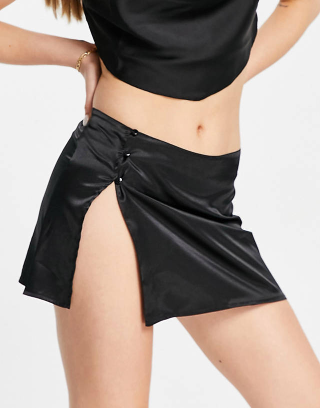 First Distraction - the label satin split mini skirt in black