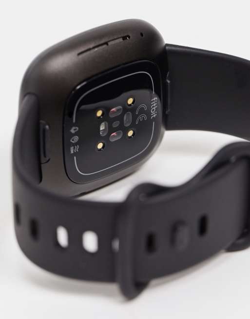 Fitbit Versa smart watch in black ASOS