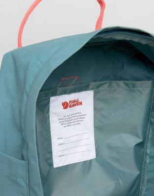 fjallraven classic kanken backpack in green with contrast pink