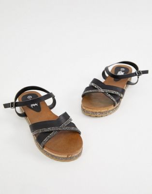 Flade sandaler fra XTI-Sort