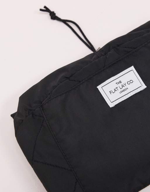 Flat Lay Co drawstring make up bag in black