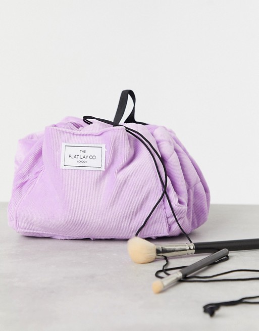 Flat Lay Co drawstring make up bag in lilac cord