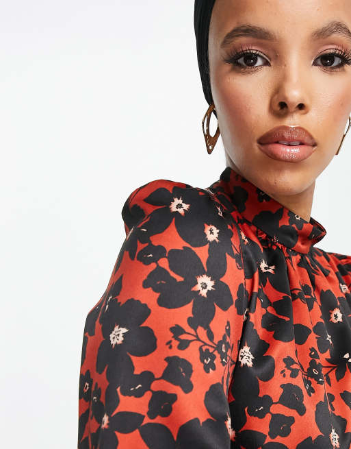 red and black floral blouse