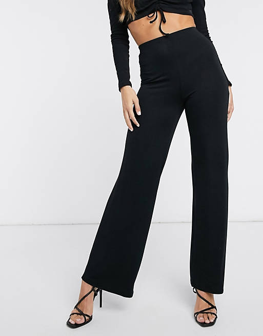 Flounce London - Basic broek met hoge taille en wijde pijpen in zwart