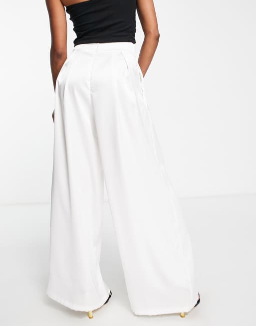Flounce London Petite satin pleated wide leg trousers in ivory ASOS