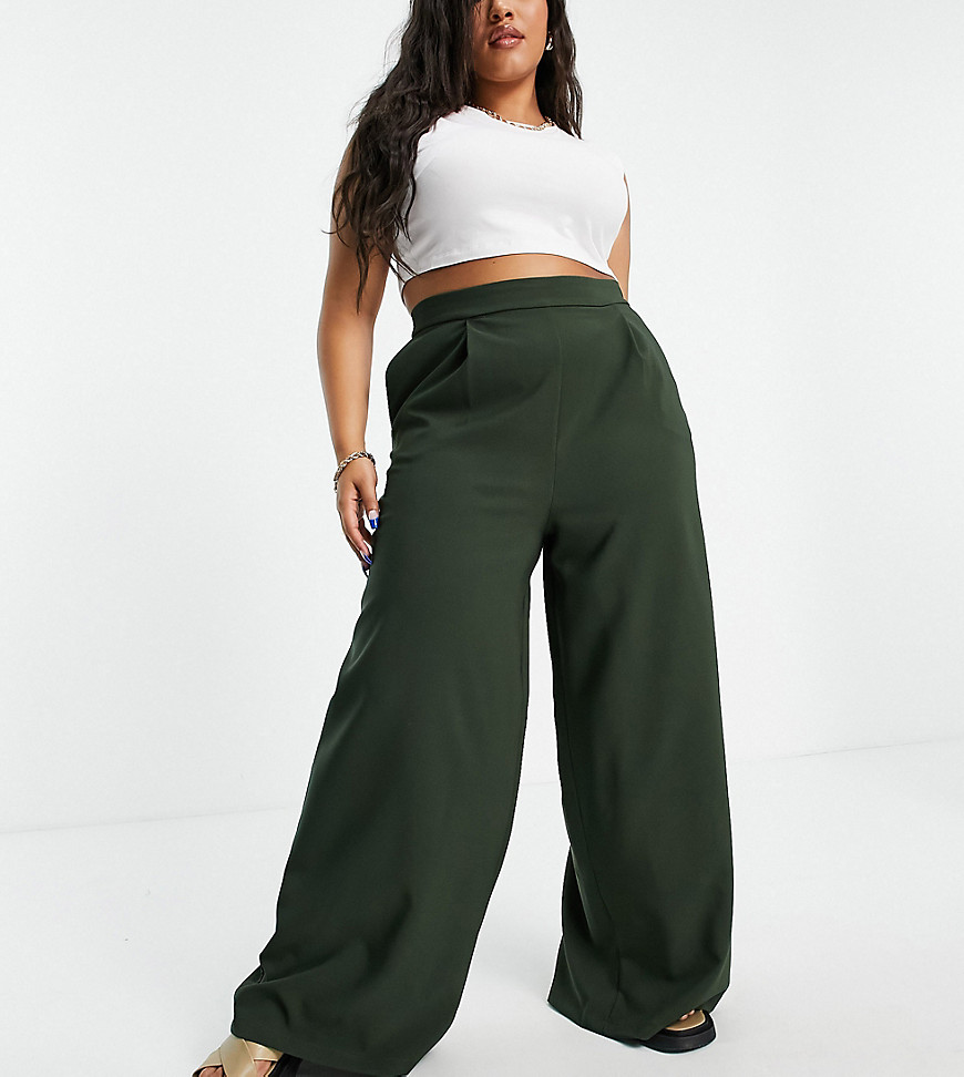 Plus-size trousers by Flounce London Laid-back luxe Plain design High rise Zip-back fastening Wide leg Regular fit
