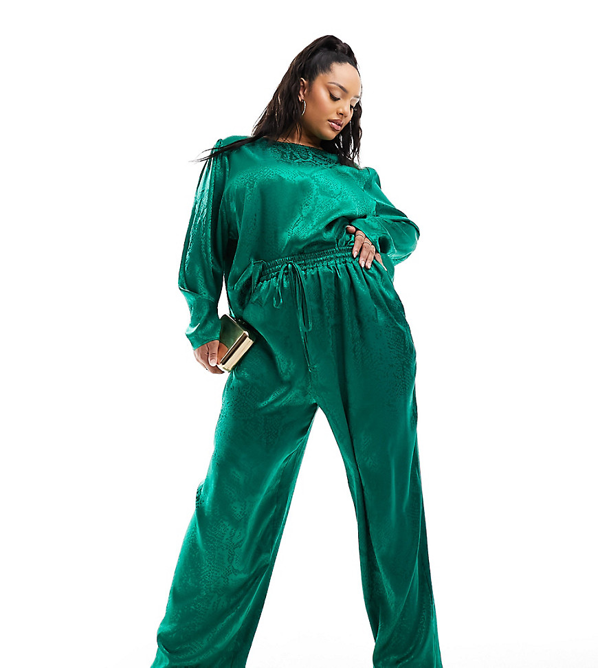 Flounce London Plus satin floaty trousers in emerald green co ord