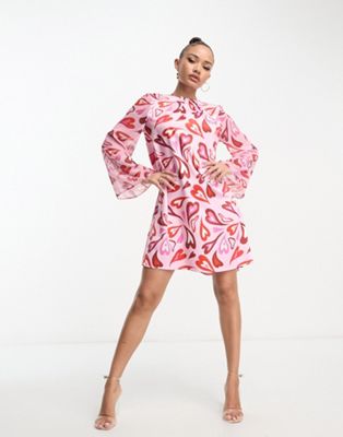 Flounce London shift mini dress with bell sleeves in mixed heart print