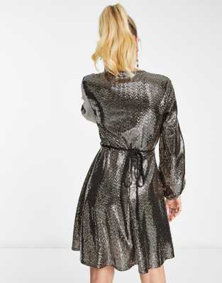 Flounce London wrap front mini dress with statement shoulder in black with  gold sequin in black/gold