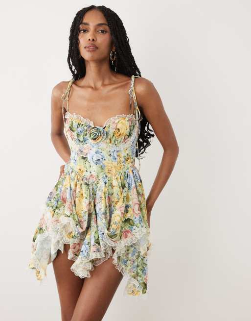 For Love & Lemons Elea robe courte à décolleté en cœur avec détail rosette imprimé fleuri multicolore