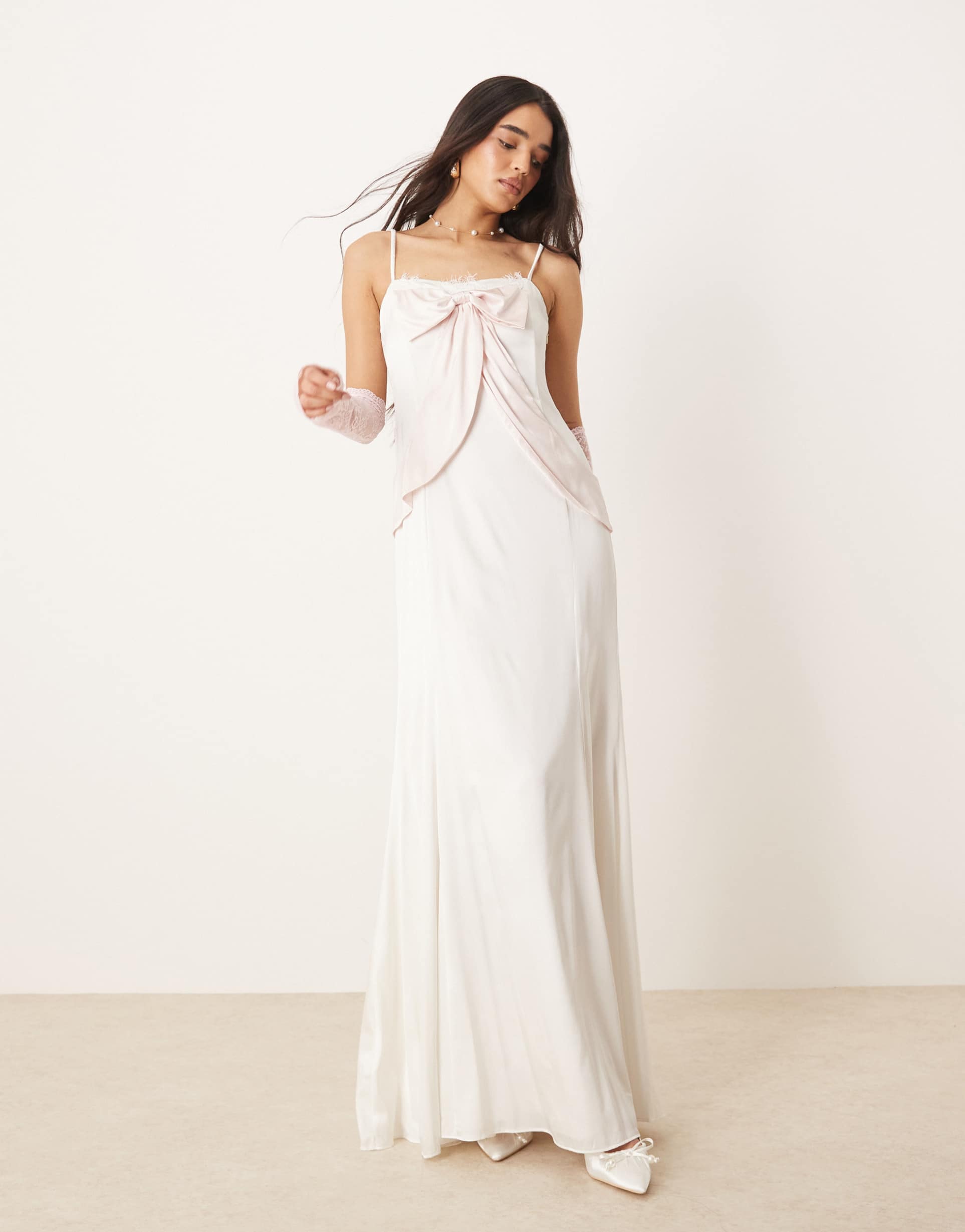 for love & lemons eliana gown in white with pink bow detail