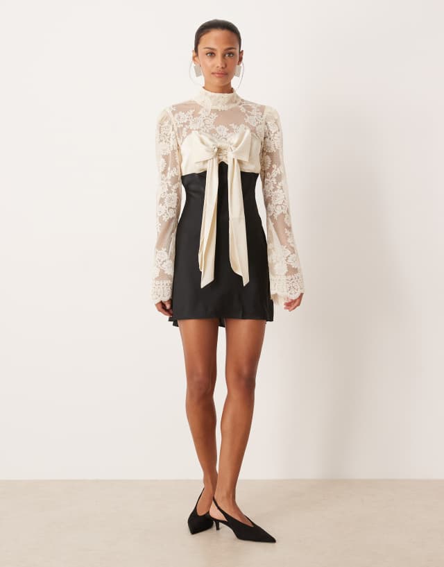 For Love & Lemons lace and satin mix long sleeve mini dress with bow bust detail in cream