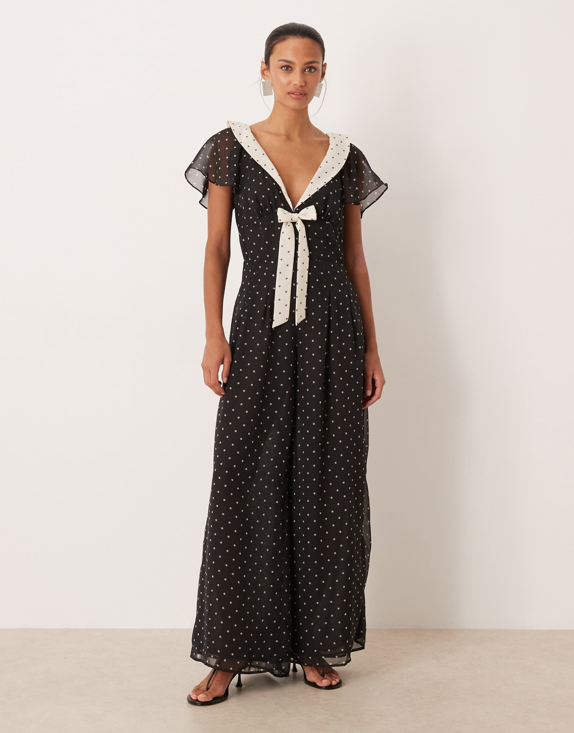 for love & lemons sailor collared jumpsuit in mono polka dot print