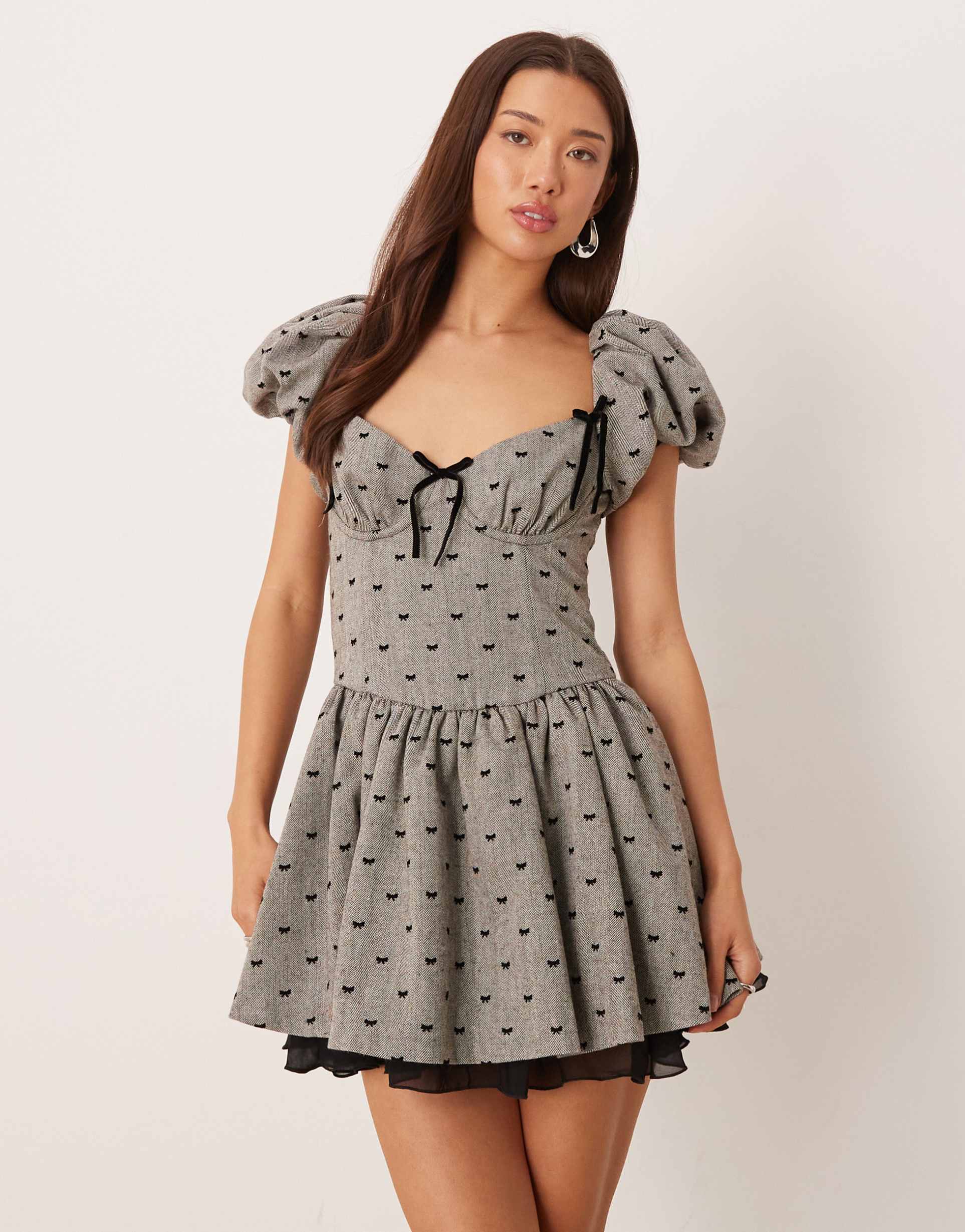 for love & lemons twill dropped waist mini dress in gray bow print