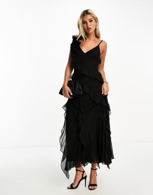 Forever New - Asymmetrisches Maxikleid in Schwarz mit Rüschen und Ansteckblume