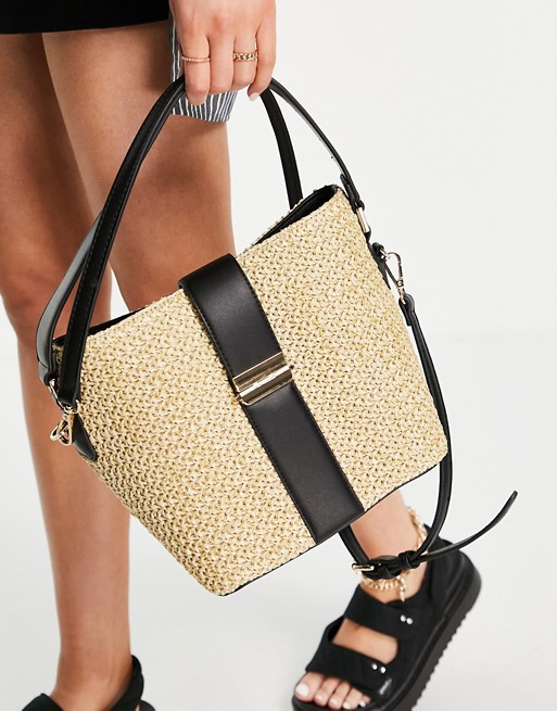 Forever New bucket bag with gold clasp in natural straw