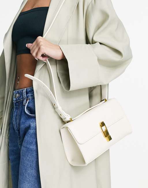 Forever New cross-body baguette bag with gold buckle in stone