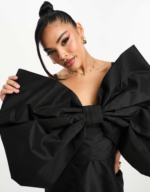 Forever Unique oversized bow bodycon mini dress in black