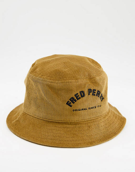 Men Caps & Hats/Fred Perry arch branded cord bucket hat in tan 