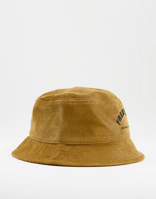 Men Caps & Hats/Fred Perry arch branded cord bucket hat in tan 