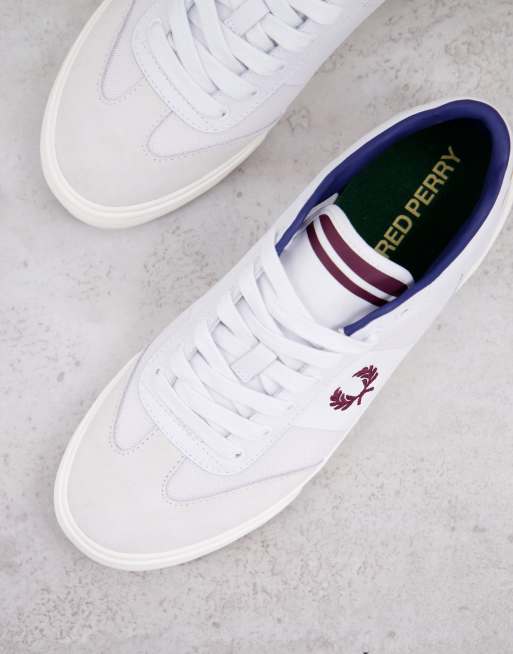 Fred Perry arch branded leather sneakers in white | ASOS