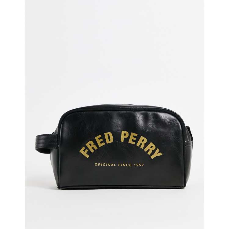 Fred Perry arch branded pu wash bag in black | ASOS