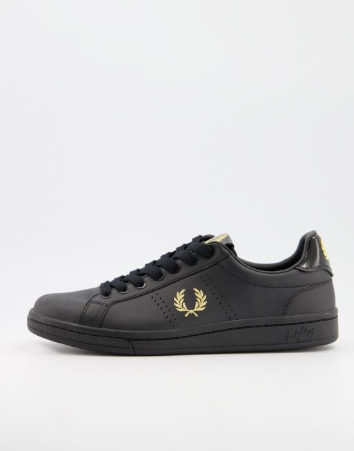 Fred Perry B1251 leather sneakers in black/gold | ASOS