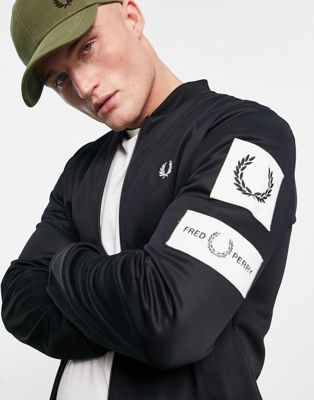 Fred Perry badge track jacket in black